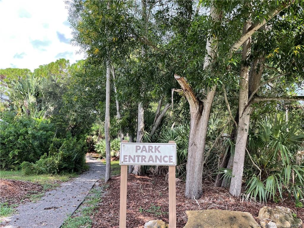 707 Southeast Pin Oak Terrace Stuart, FL 34997 - Photo 4 of 27 Private community recreation area in a beautiful natural wooded area. Stone walking path.