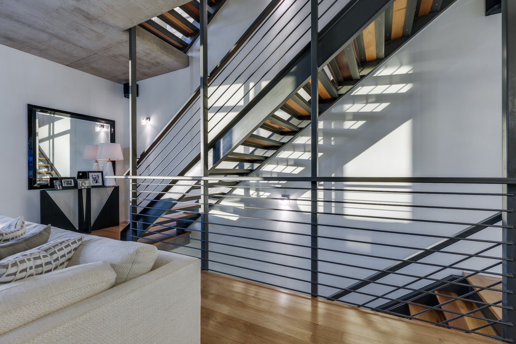 2301 South 5th Street, Unit 5 Austin, TX 78704 - Photo 23 of 39 Stairs featuring hardwood / wood-style floors