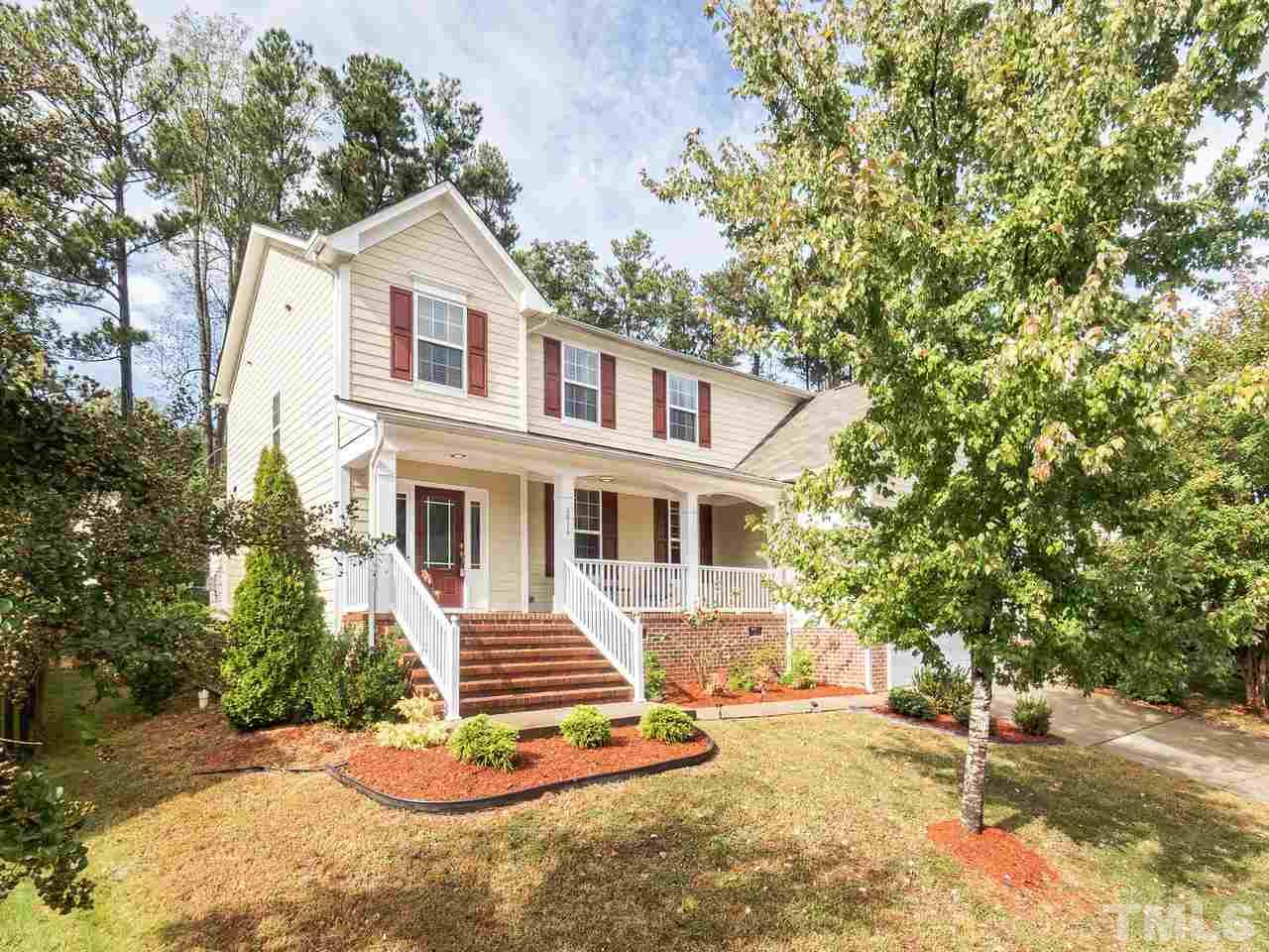 3016 Red Grape Drive Raleigh, NC 27607 - Photo 1 of 23 a front view of a house with a yard