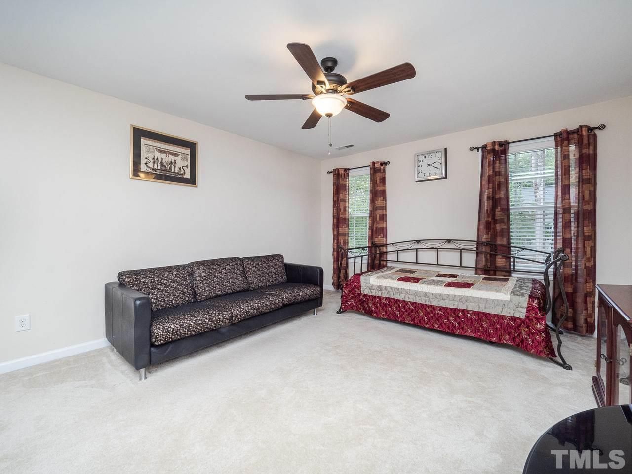 3016 Red Grape Drive Raleigh, NC 27607 - Photo 13 of 23 a living room with furniture