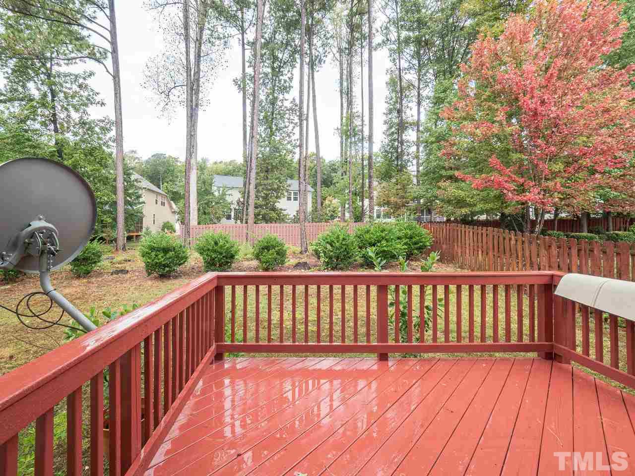 3016 Red Grape Drive Raleigh, NC 27607 - Photo 20 of 23 a view of balcony with wooden floor and outdoor seating