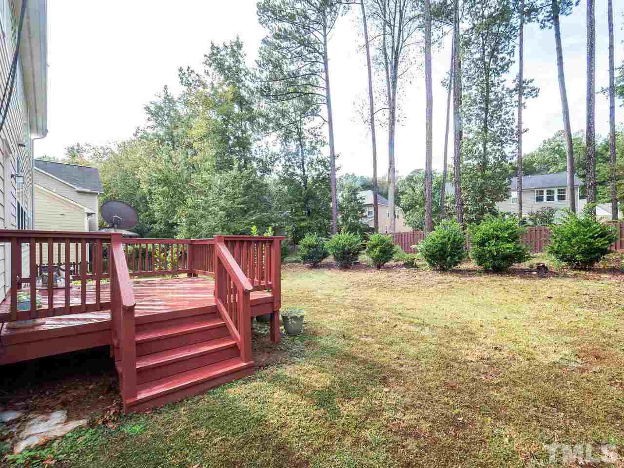 3016 Red Grape Drive Raleigh, NC 27607 - Photo 21 of 23 a view of a deck with a backyard