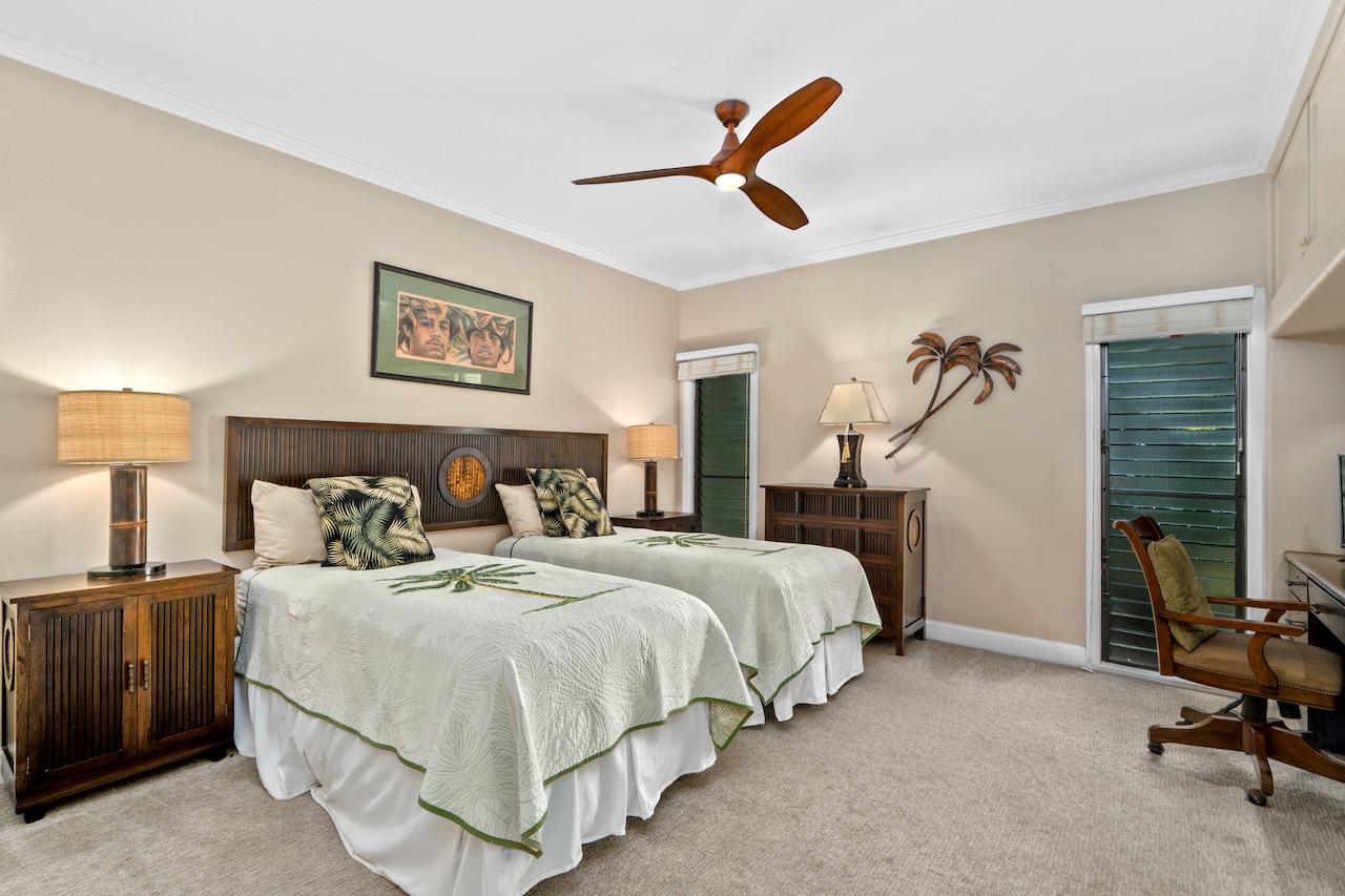 1565 Pe'e Road, Unit 211 Koloa, HI 96756 - Photo 17 of 30 a bedroom with bed and window