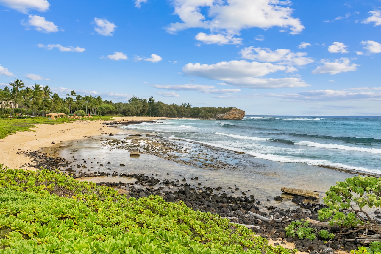 1565 Pe'e Road, Unit 211 Koloa, HI 96756 - Photo 25 of 30 a view of an ocean beach