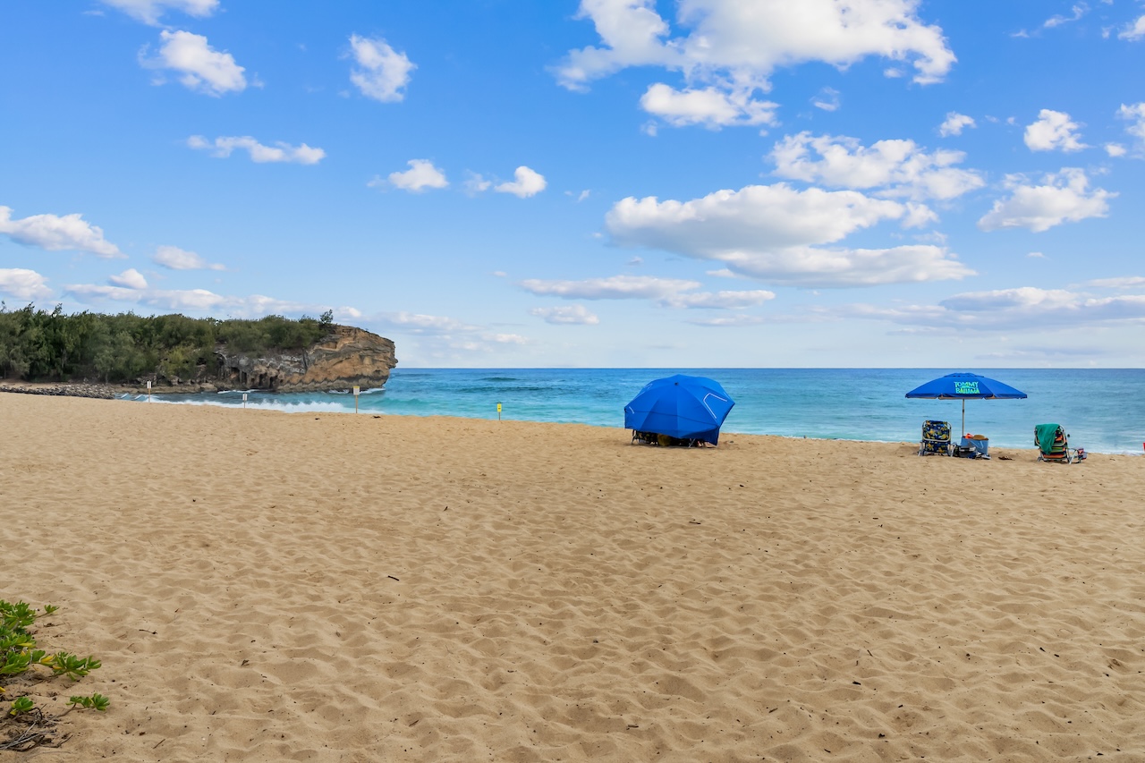 1565 Pe'e Road, Unit 211 Koloa, HI 96756 - Photo 26 of 30 a view of a lake and mountain