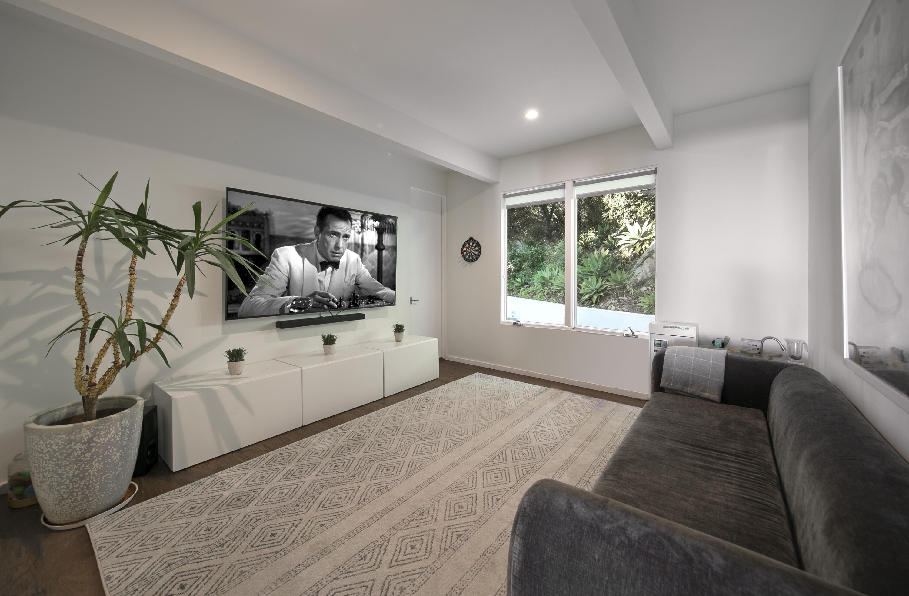 975 Mariposa Lane Montecito, CA 93108 - Photo 11 of 19 a bedroom with furniture and a window
