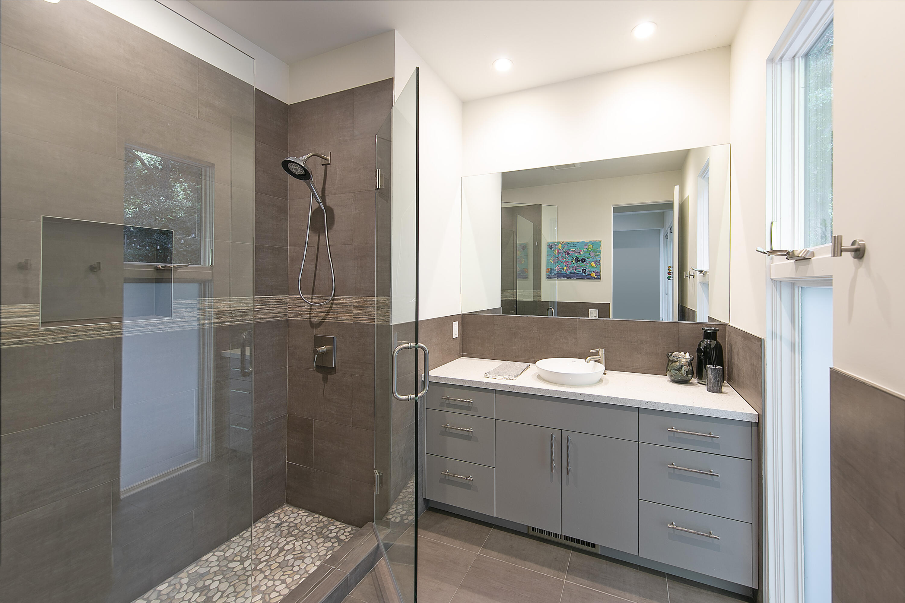 975 Mariposa Lane Montecito, CA 93108 - Photo 12 of 19 a bathroom with a double vanity sink mirror and shower