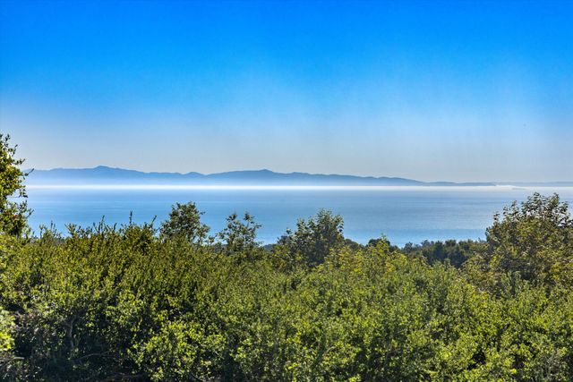 a sunset view with ocean view