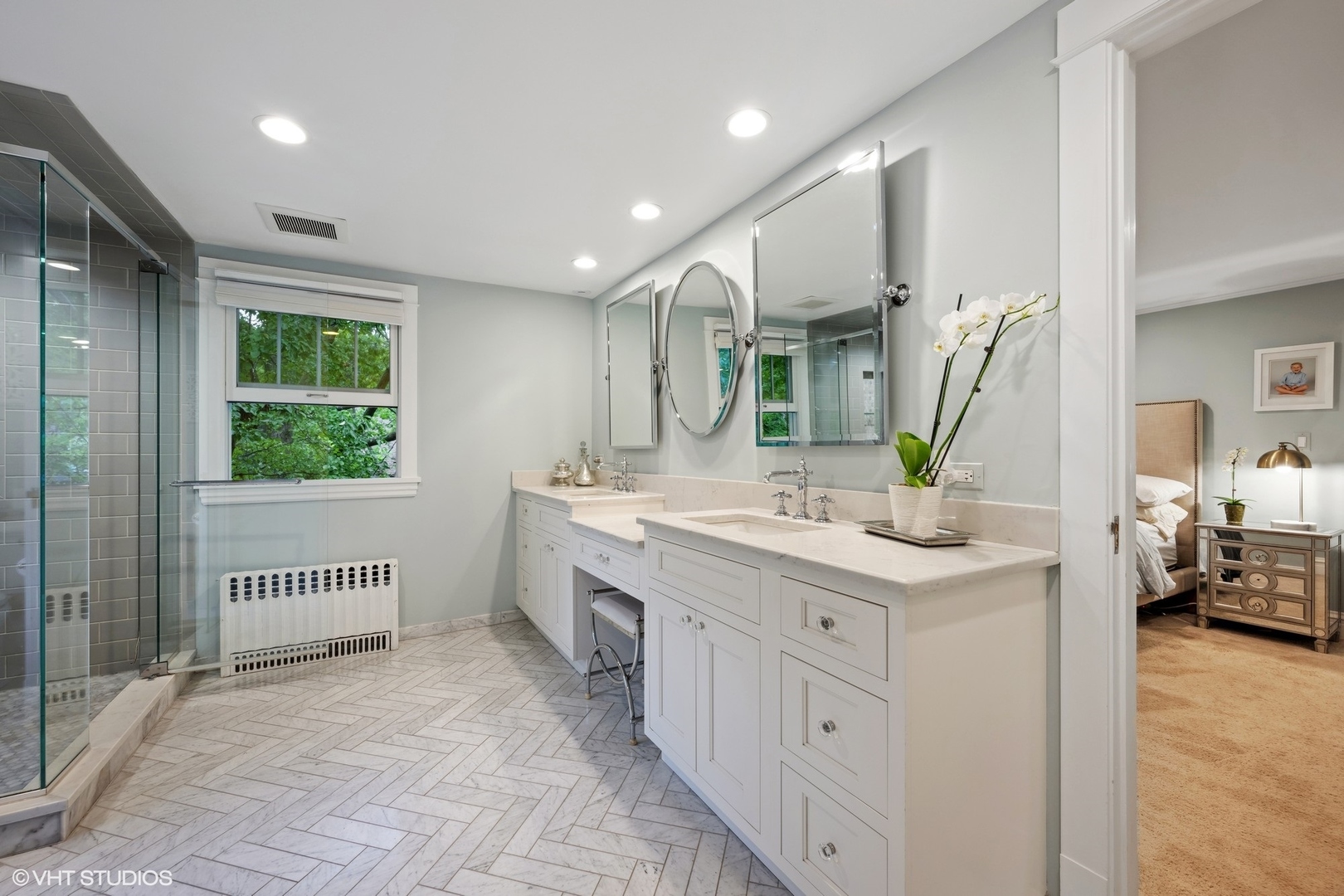 433 Maple Avenue Wilmette, IL 60091 - Photo 13 of 34 a bathroom with a sink a mirror and a window