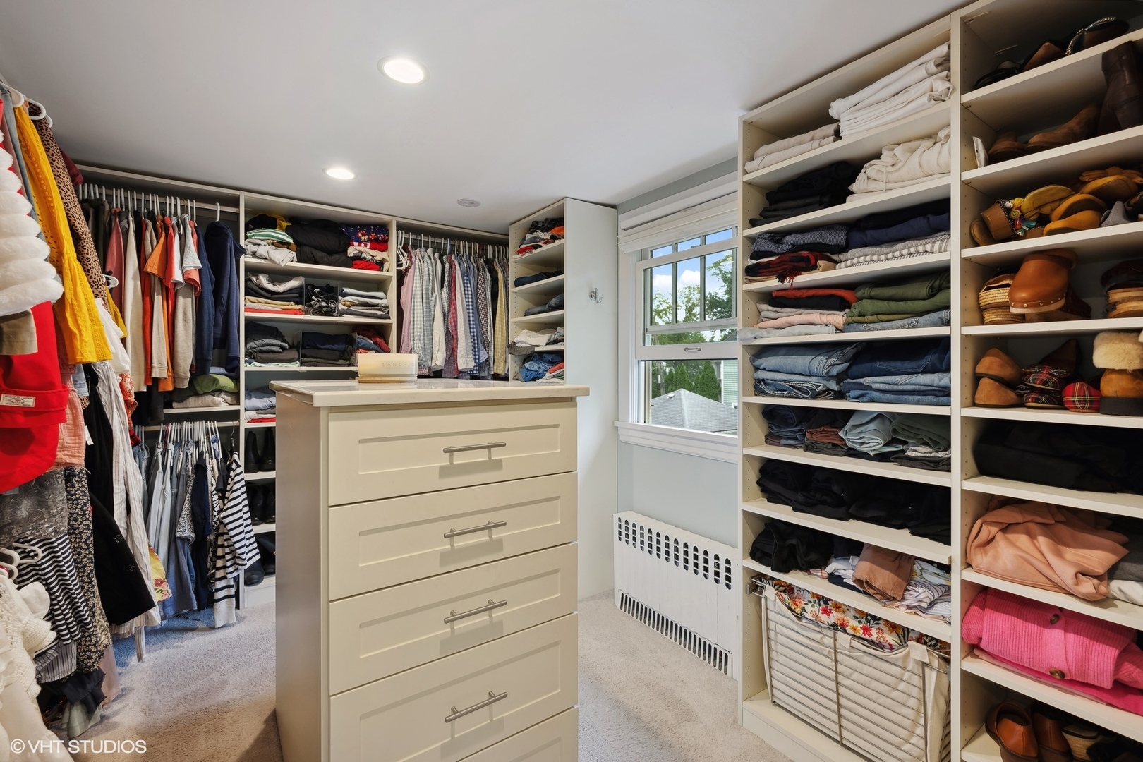 433 Maple Avenue Wilmette, IL 60091 - Photo 15 of 34 a view of walk in closet with clothes and shoes