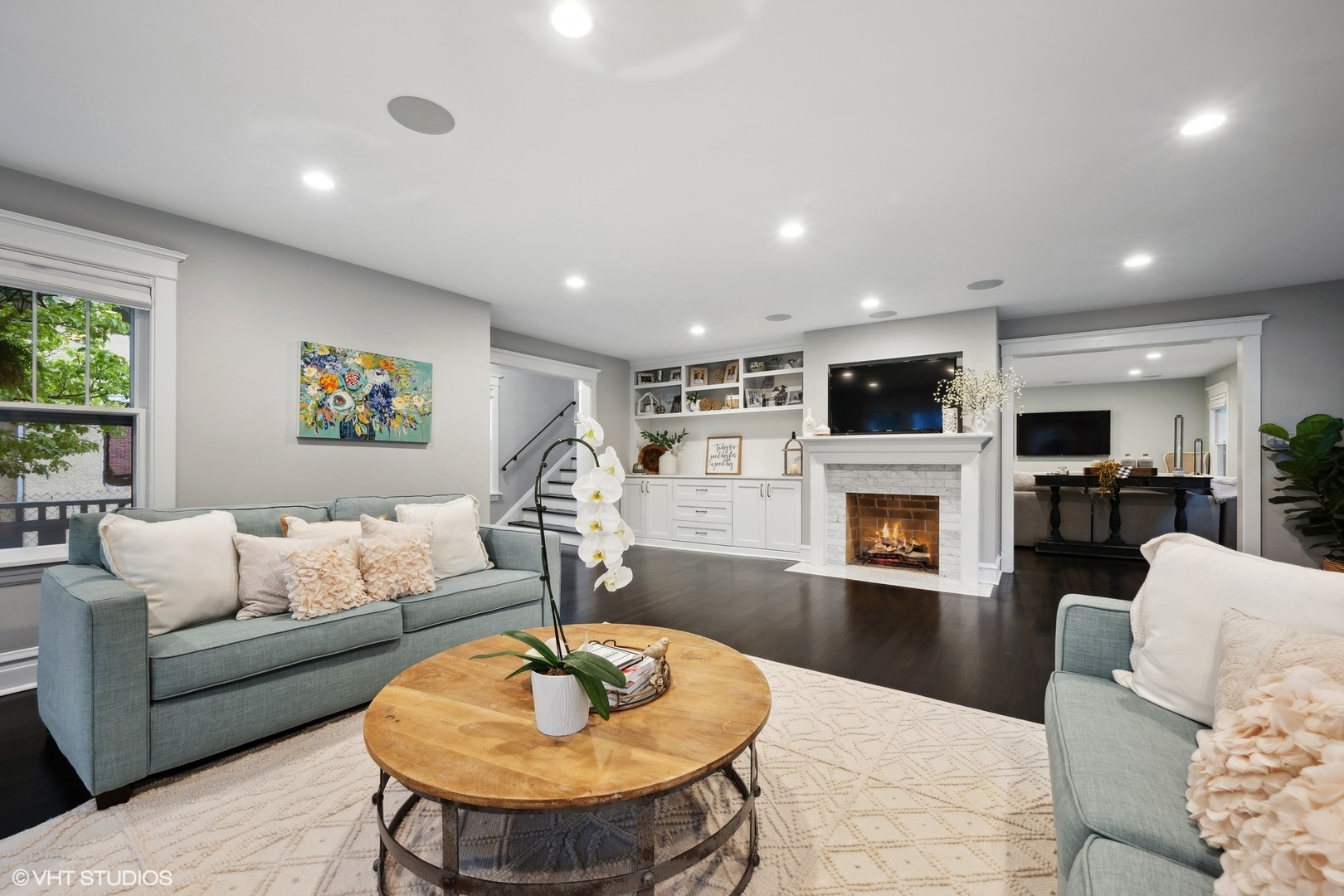 433 Maple Avenue Wilmette, IL 60091 - Photo 2 of 34 a living room with furniture and a fireplace