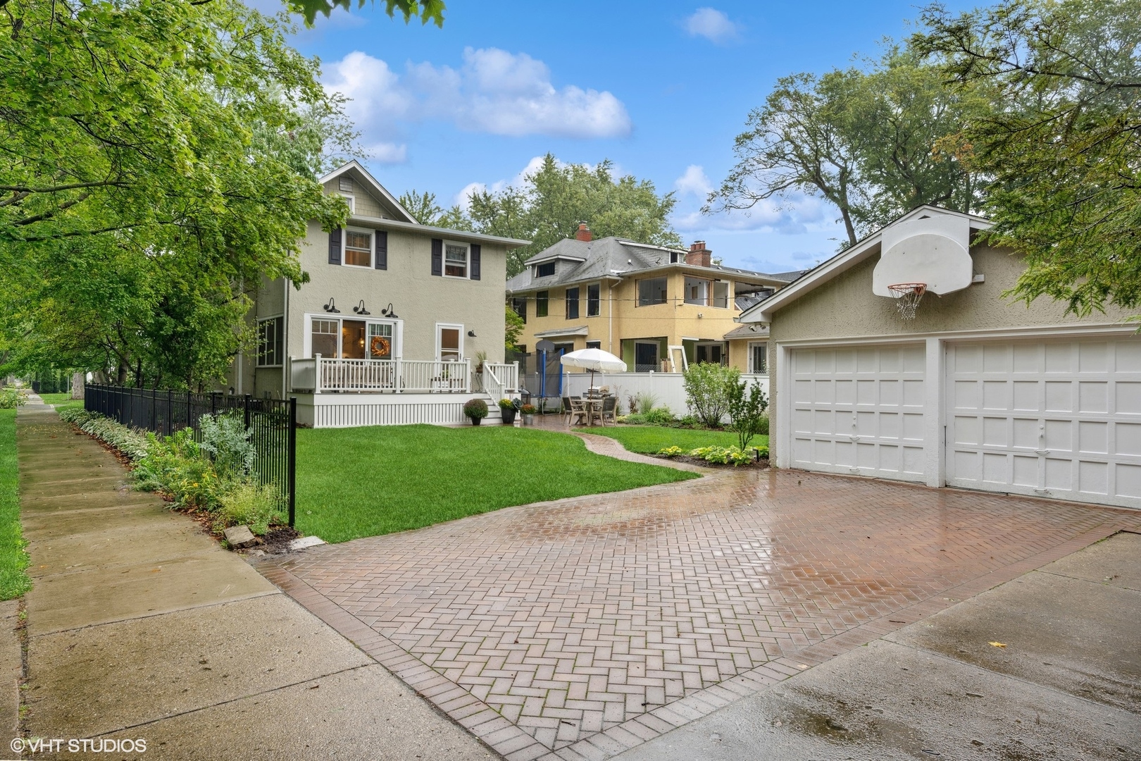 433 Maple Avenue Wilmette, IL 60091 - Photo 29 of 34 a front view of a house with a yard and garage