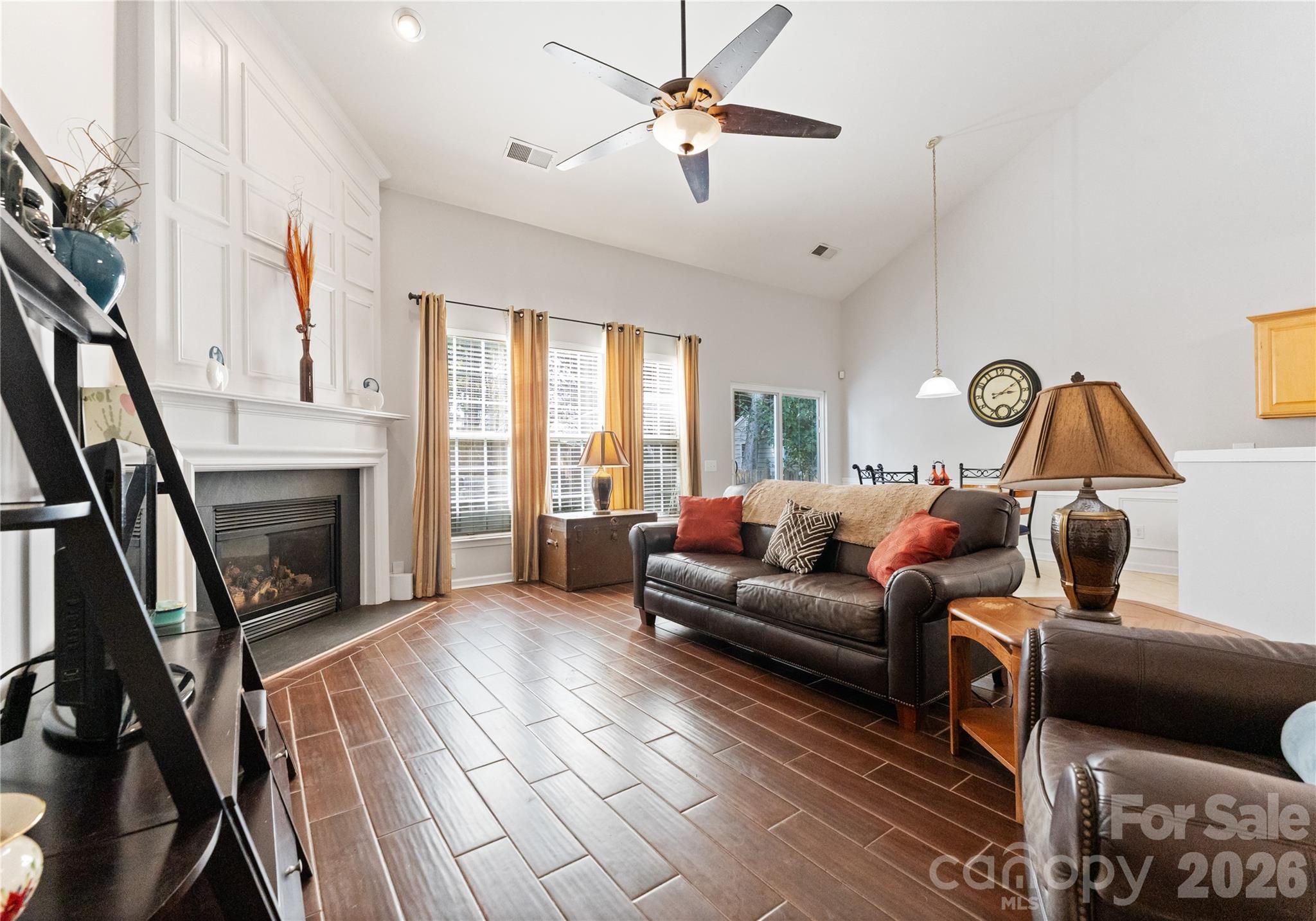 20127 Beard Street Cornelius, NC 28031 - Photo 13 of 41 a living room with furniture and a fireplace