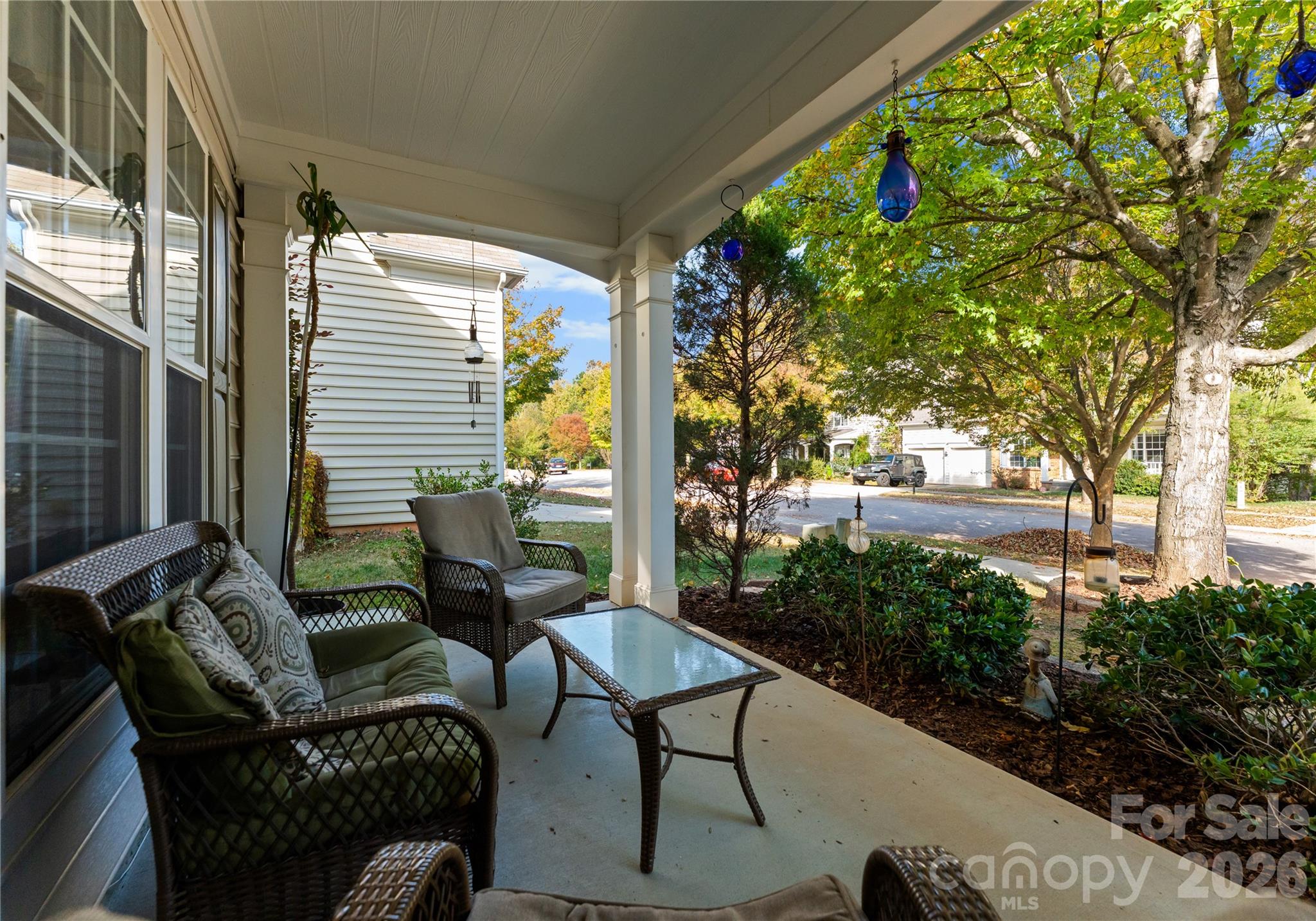 20127 Beard Street Cornelius, NC 28031 - Photo 2 of 41 a view of a chair and tables in the patio