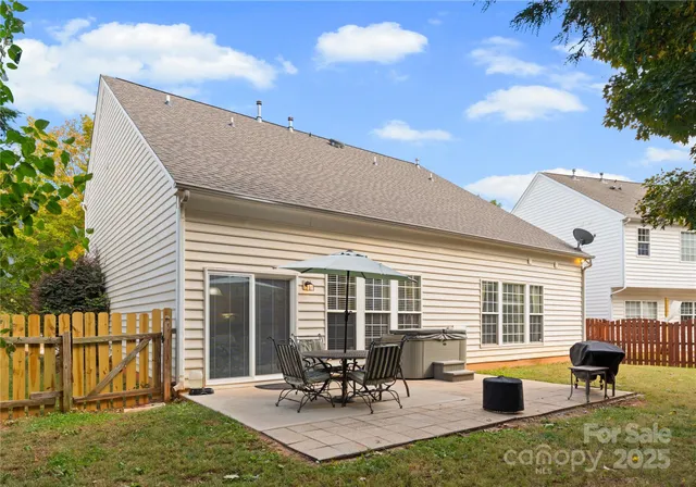 a view of swimming pool with outdoor seating