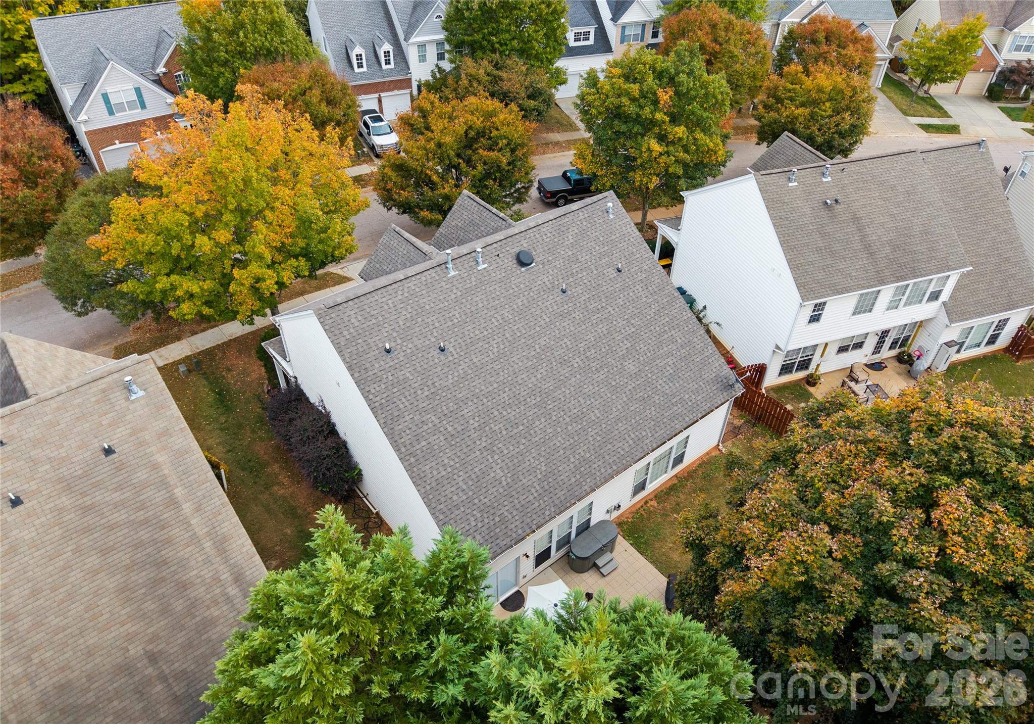 20127 Beard Street Cornelius, NC 28031 - Photo 33 of 41 an aerial view of a house with a yard and garden
