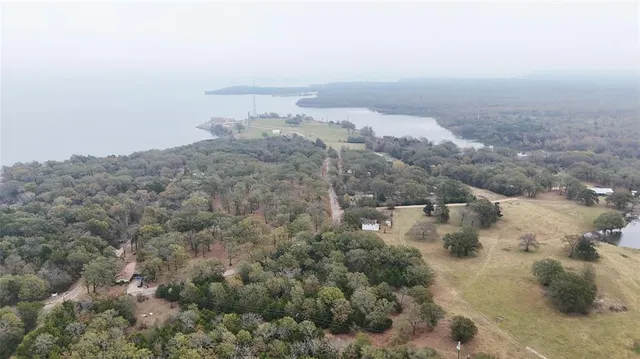 an aerial view of houses with outdoor space