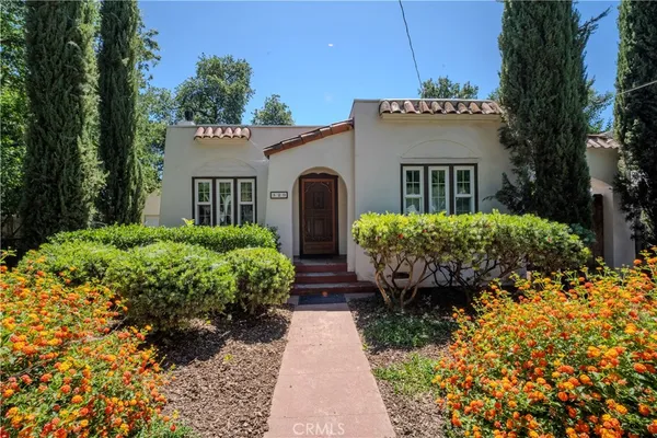a house view with a garden space
