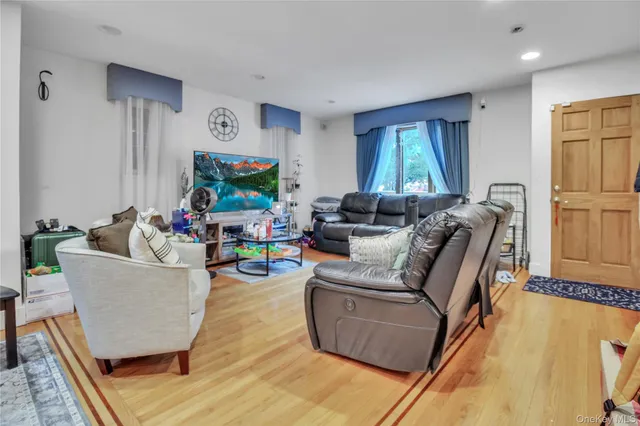 a dining room with furniture and window