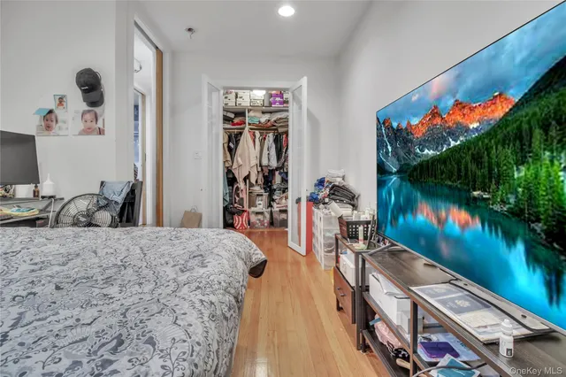 a kitchen with stainless steel appliances granite countertop a refrigerator a stove top oven a sink and dishwasher