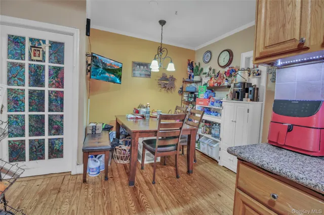 a dining room filled a table and chairs
