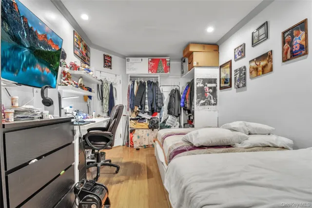 a bed room with a bed and a desk