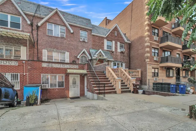 a view of street with parked cars