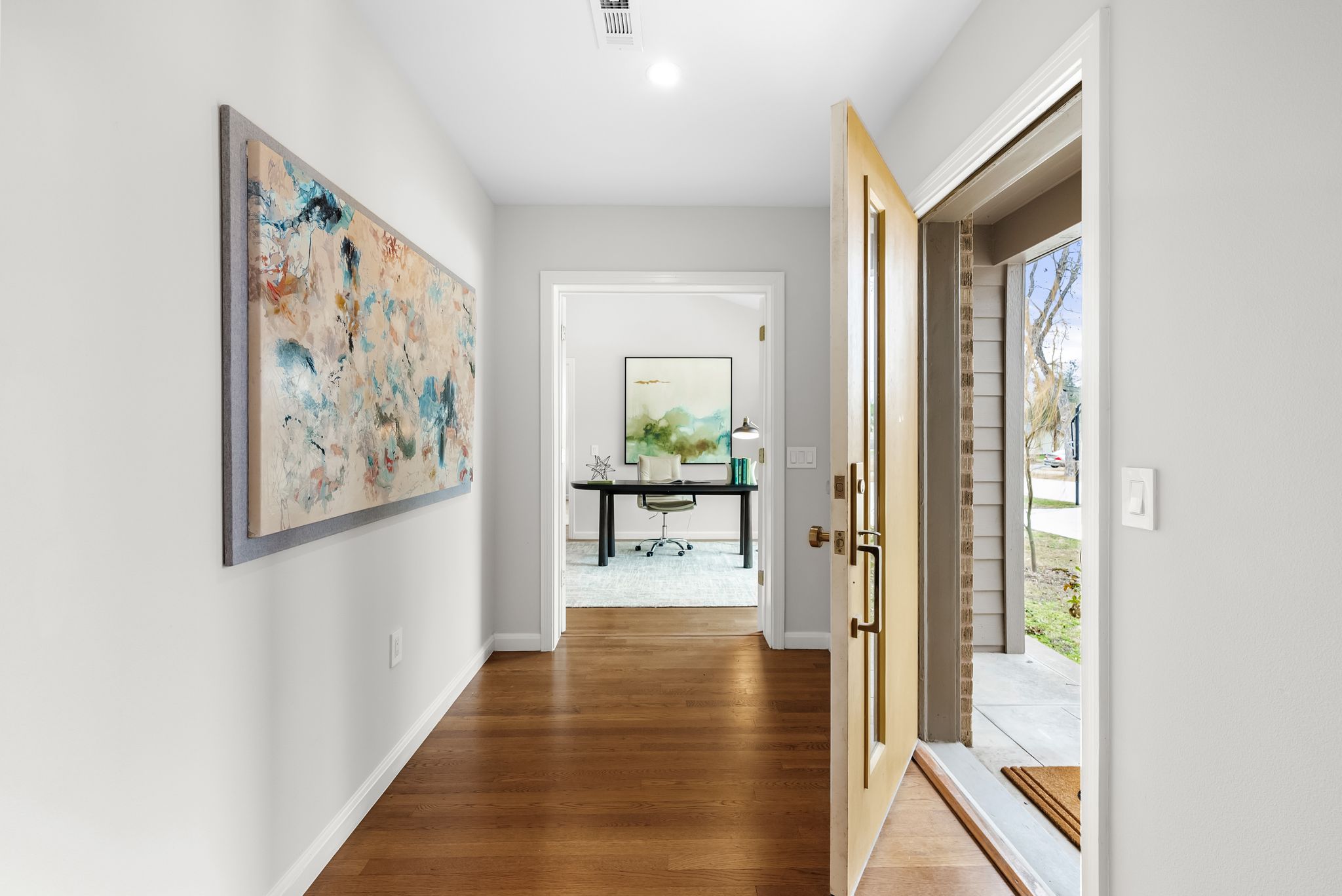 1612 Meadow Lane Taylor, TX 76574 - Photo 14 of 35 Grand entry way which leads to the office and to the living room.