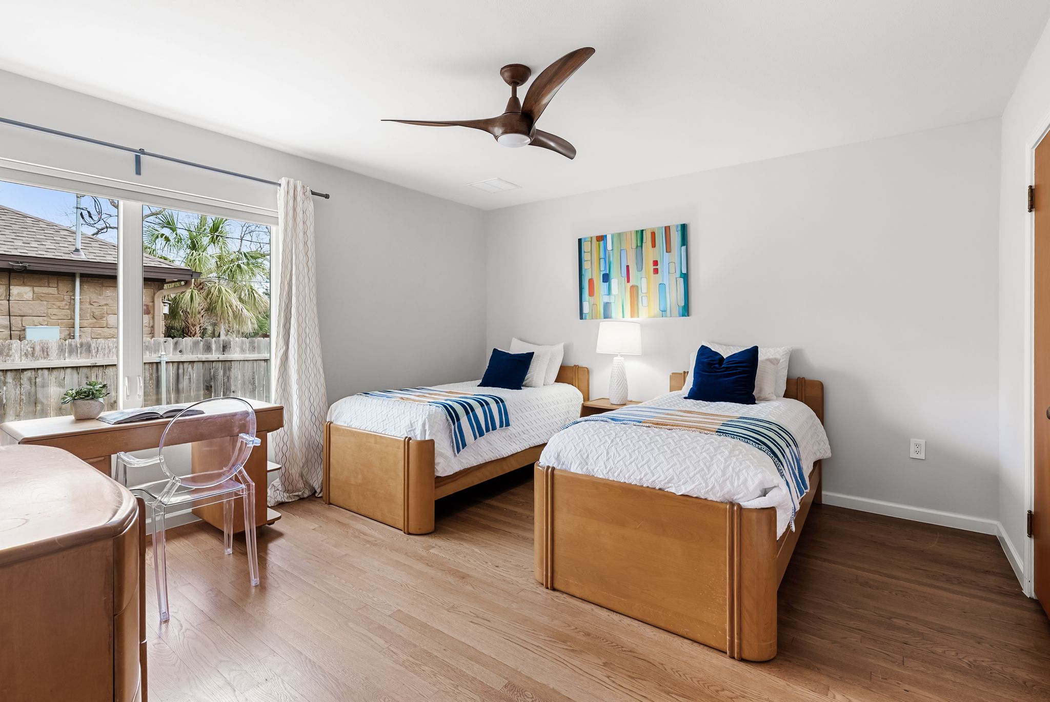 1612 Meadow Lane Taylor, TX 76574 - Photo 24 of 35 Huge guest bedroom with gorgeous hardwood floors!