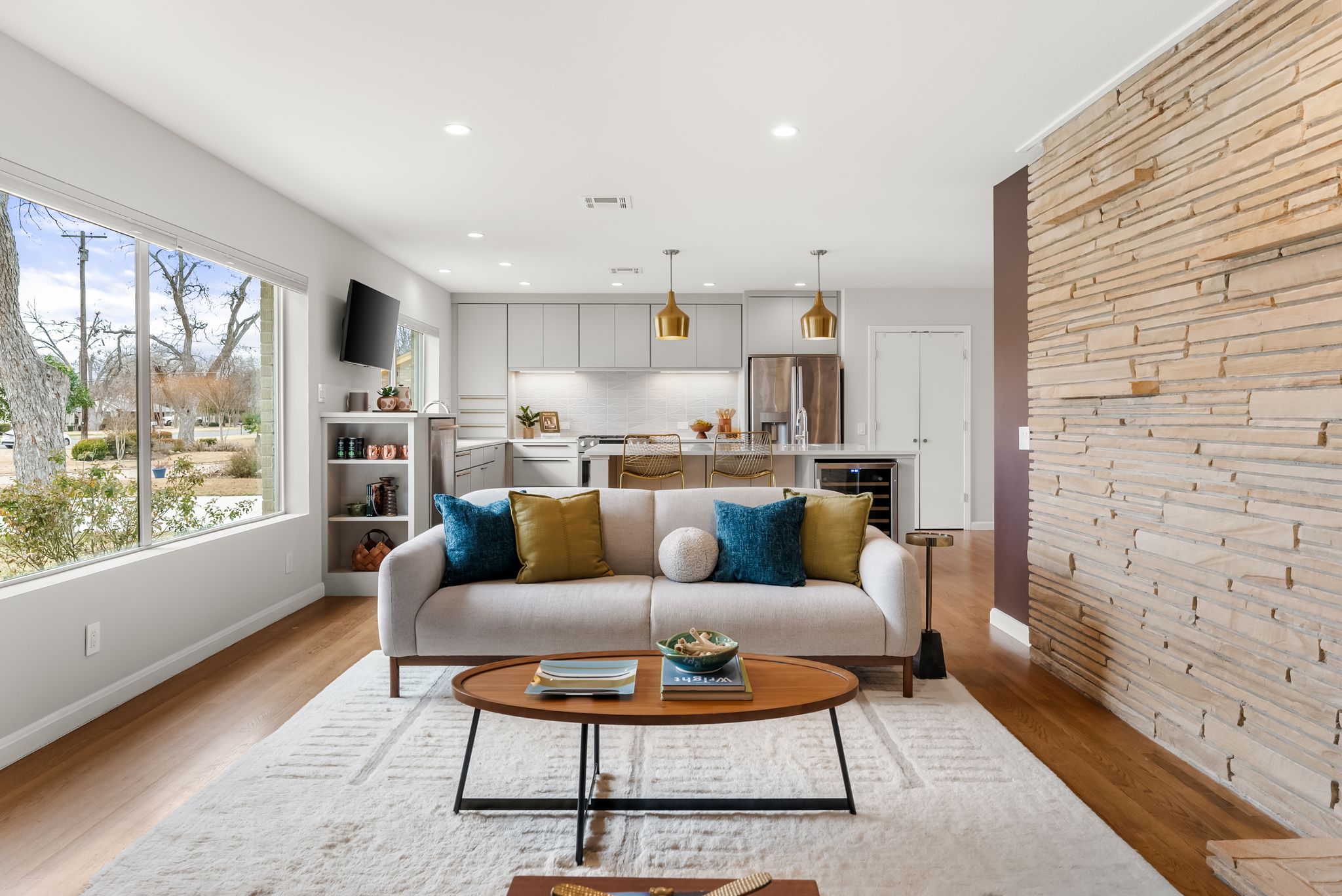 1612 Meadow Lane Taylor, TX 76574 - Photo 4 of 36 The living room opens directly to the chef's kitchen!