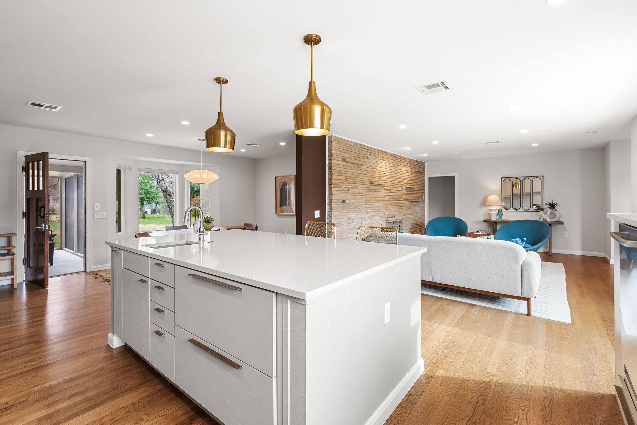 1612 Meadow Lane Taylor, TX 76574 - Photo 10 of 35 Kitchen overlooks the living room and dining room with views to both the front and back yard. Easy access to the large screened porch!