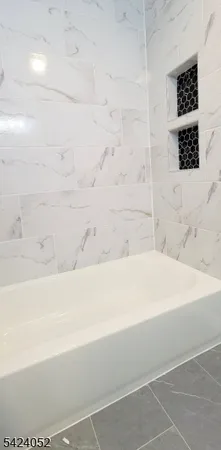 a bathroom with a bathtub