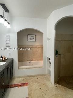 101 Southwest 101st Terrace, Unit 101 Plantation, FL 33324 - Photo 14 of 15 a view of a bathroom with a sink