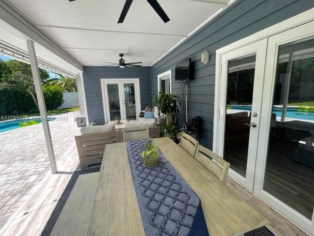 101 Southwest 101st Terrace, Unit 101 Plantation, FL 33324 - Photo 3 of 15 a view of a house with a porch