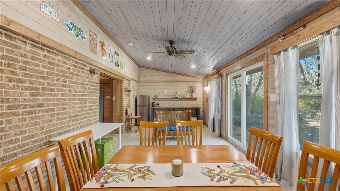 3781 Ridgeway Drive San Antonio, TX 78259 - Photo 23 of 44 a view of a dining room with furniture wooden floor and chandelier