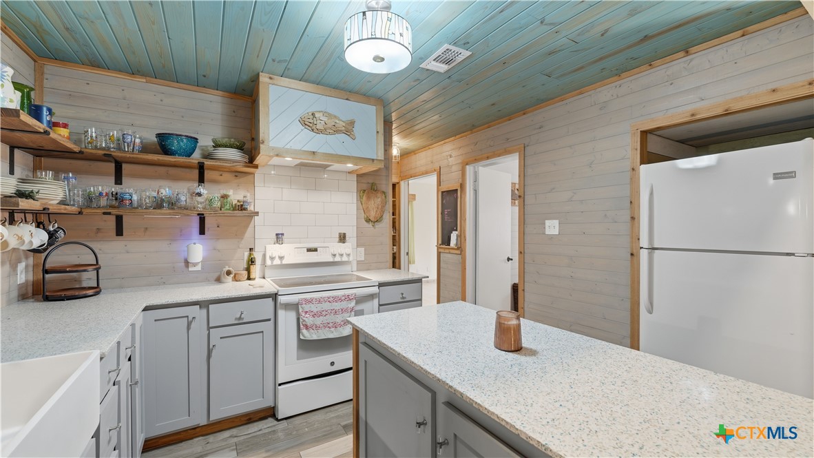3781 Ridgeway Drive San Antonio, TX 78259 - Photo 37 of 44 a kitchen with a sink appliances and cabinets