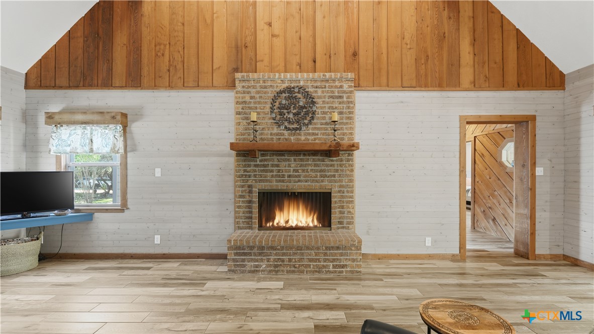 3781 Ridgeway Drive San Antonio, TX 78259 - Photo 39 of 44 a living room with furniture and a fireplace