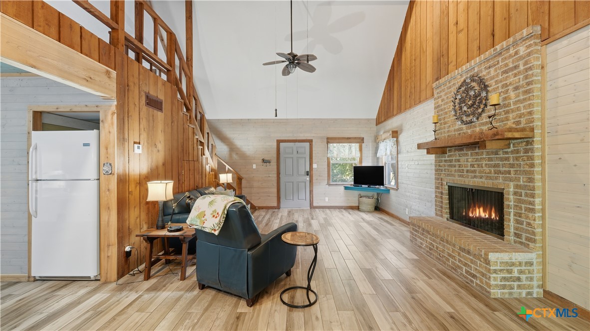 3781 Ridgeway Drive San Antonio, TX 78259 - Photo 40 of 44 a living room with furniture and a fireplace