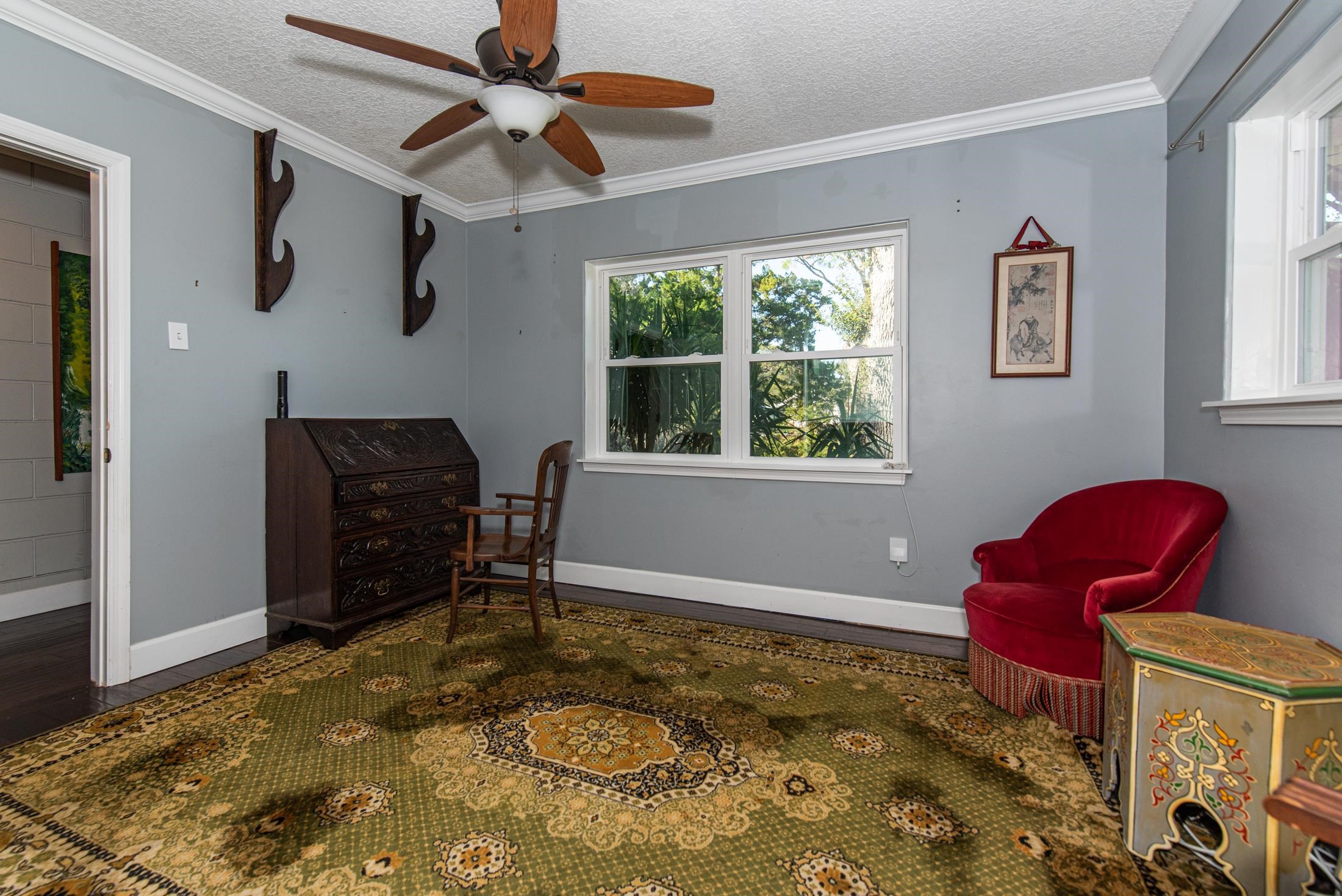 134 Neptune Road St. Augustine, FL 32086 - Photo 24 of 36 a workspace room with furniture rug and window