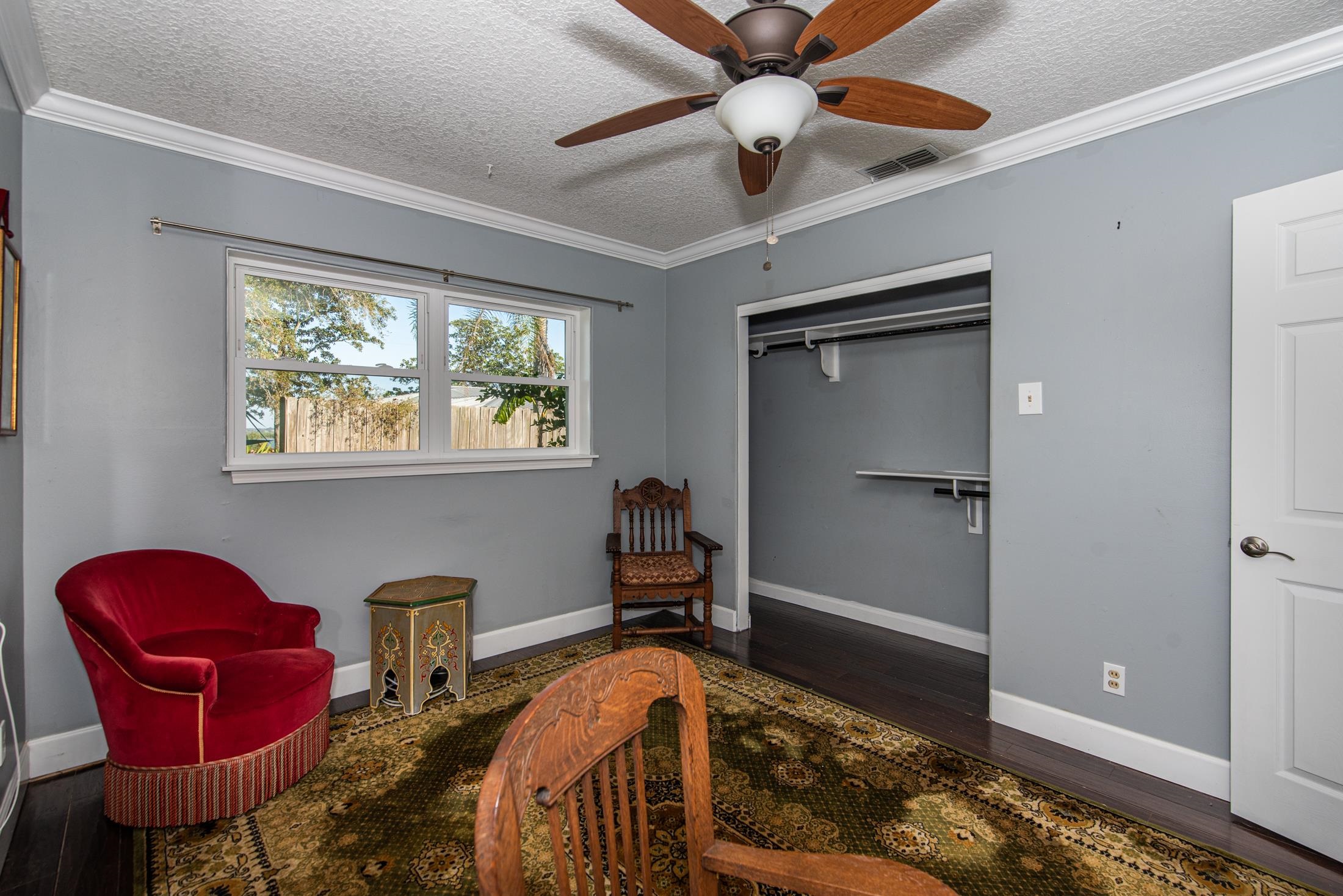 134 Neptune Road St. Augustine, FL 32086 - Photo 25 of 36 a bedroom with furniture and a window