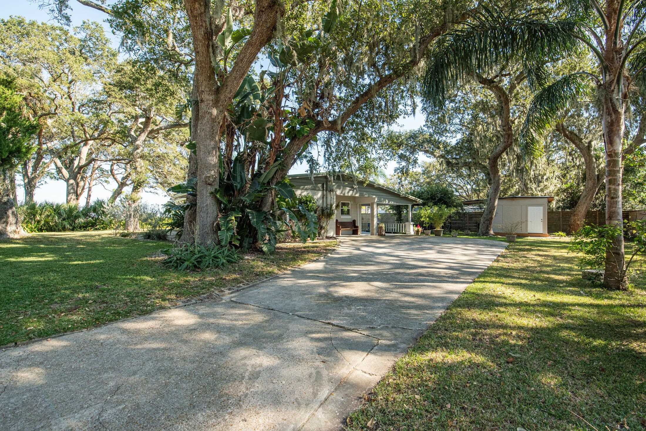 134 Neptune Road St. Augustine, FL 32086 - Photo 3 of 36 a view of a house with a yard
