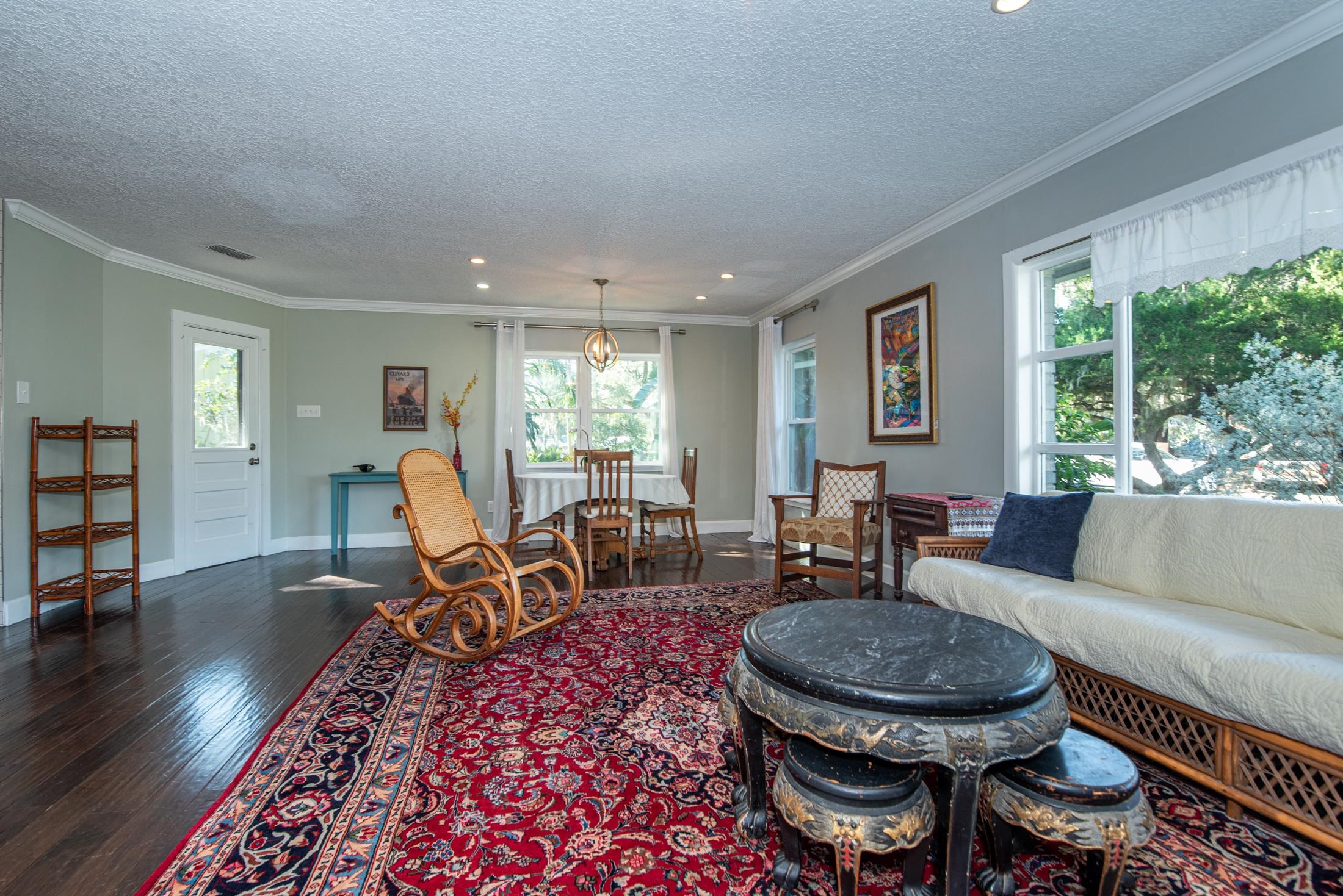 134 Neptune Road St. Augustine, FL 32086 - Photo 8 of 36 a living room with furniture and a rug