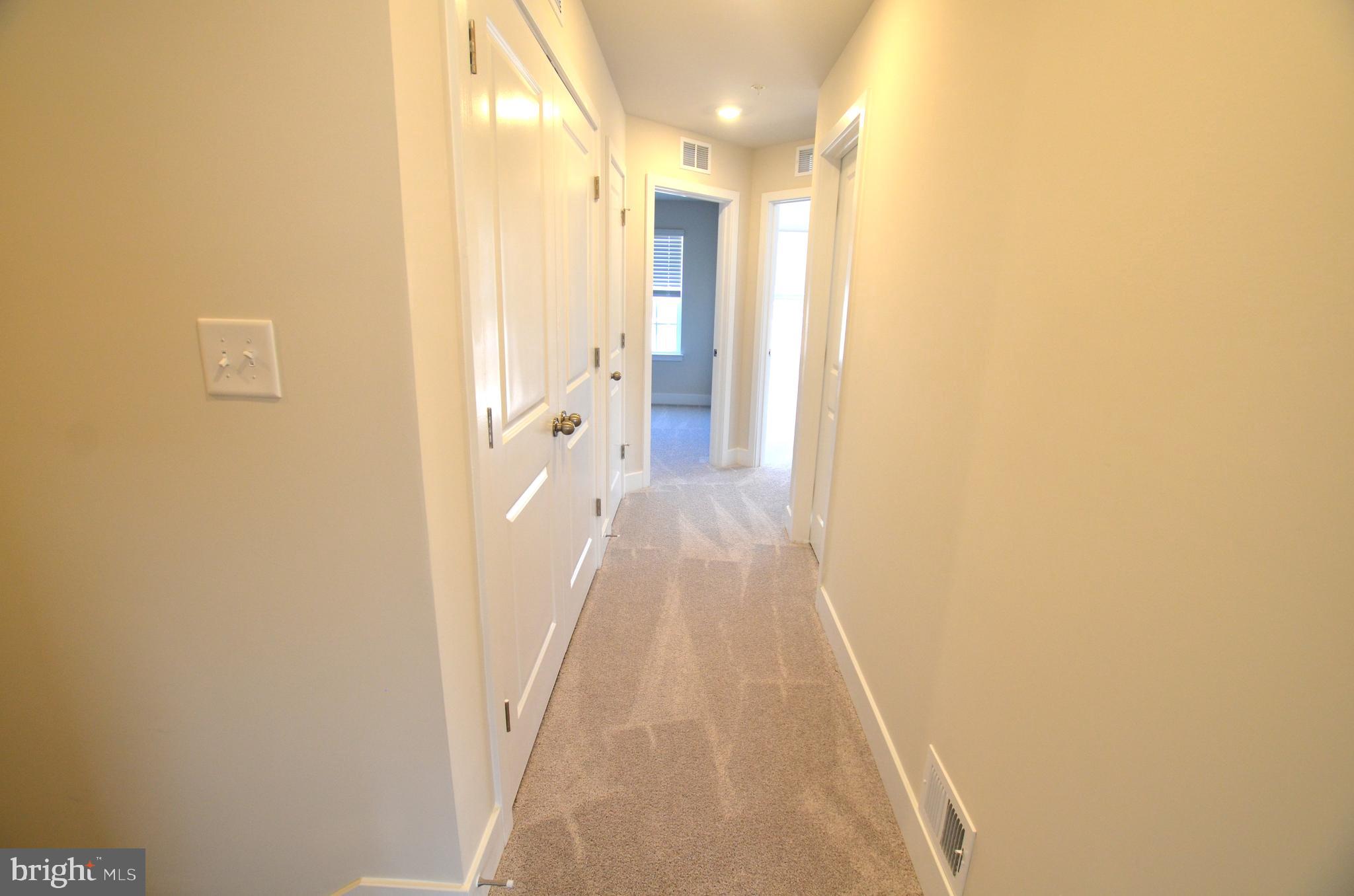1832 Parham Way Baltimore, MD 21244 - Photo 17 of 25 a view of a bathroom from the hallway