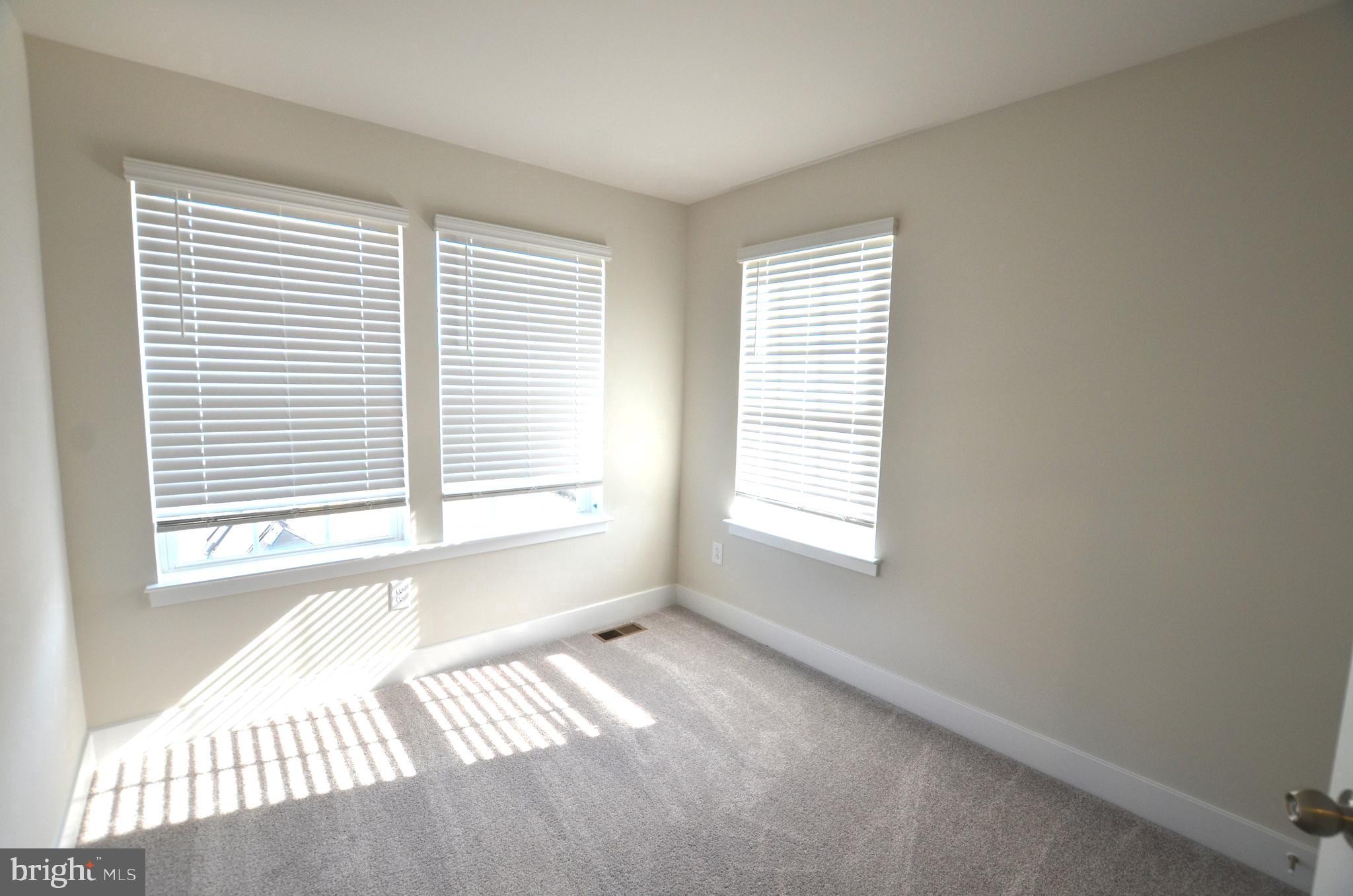 1832 Parham Way Baltimore, MD 21244 - Photo 20 of 25 a view of an empty room with a window