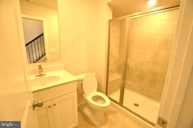a bathroom with a sink and a shower