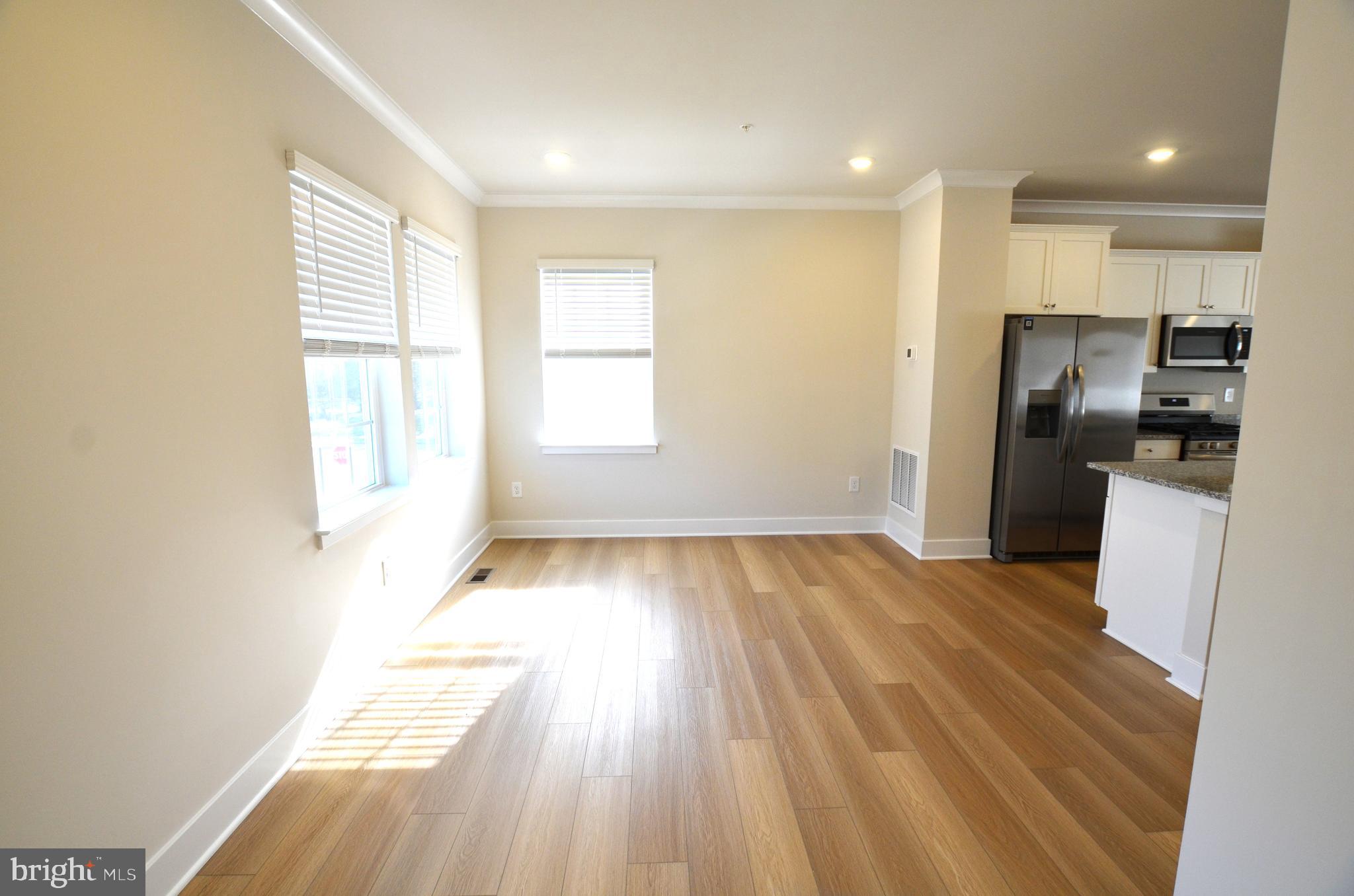 1832 Parham Way Baltimore, MD 21244 - Photo 10 of 25 a view of a kitchen with a sink and refrigerator