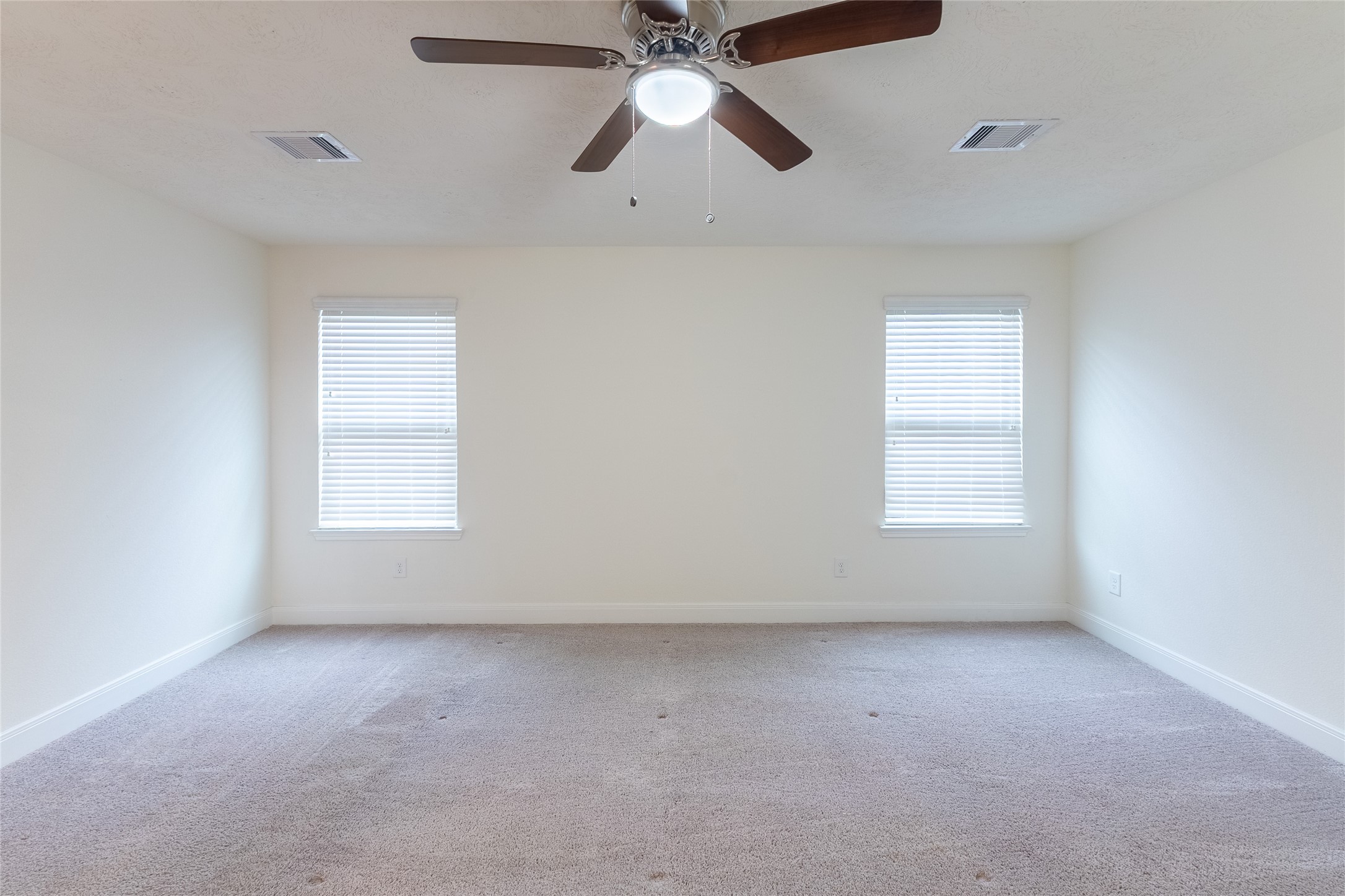 27646 Mesabe Drive Magnolia, TX 77354 - Photo 17 of 24 an empty room with chandelier fan
