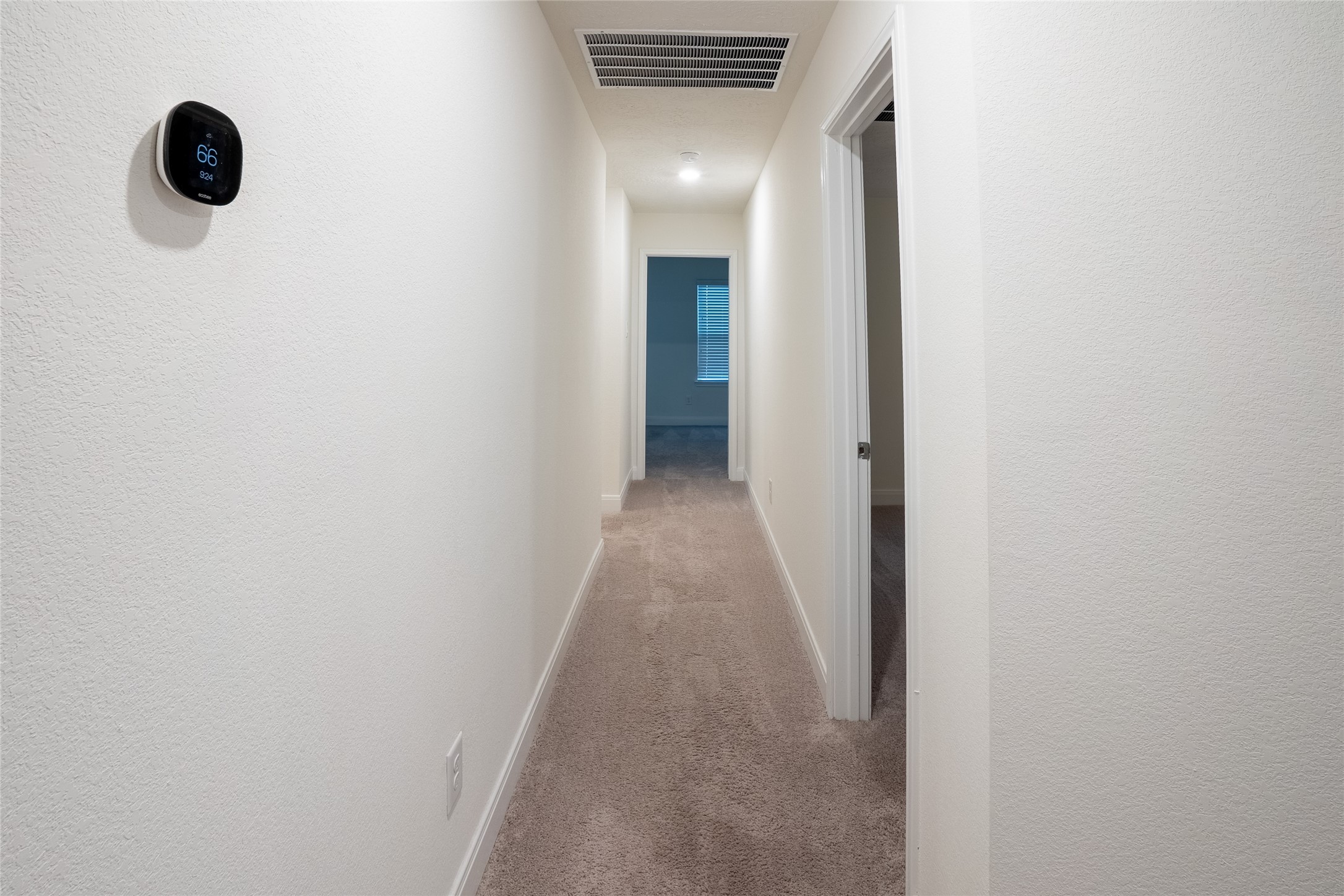 27646 Mesabe Drive Magnolia, TX 77354 - Photo 18 of 24 a view of a hallway with wooden floor