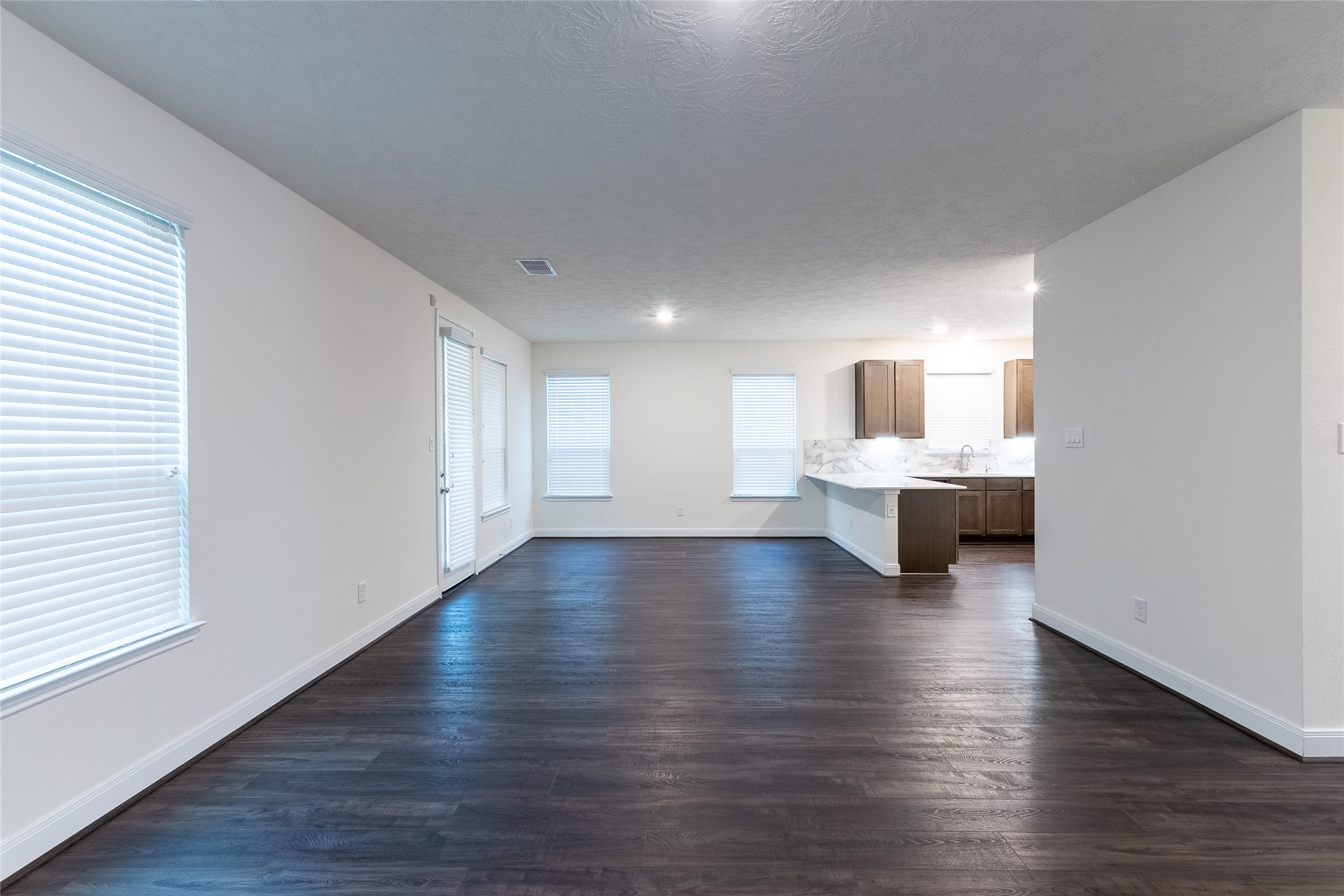 27646 Mesabe Drive Magnolia, TX 77354 - Photo 5 of 24 a view of a living room hardwood and bedroom with wooden floor