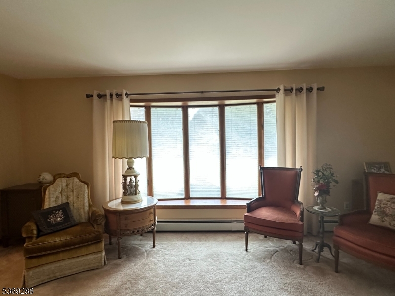15 Luff Road Boonton, NJ 07005 - Photo 11 of 43 a living room with furniture and a window